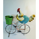 Веселата кокошчица на колело
